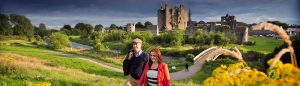 Couple walking at Trim castle in the Boyne Valley